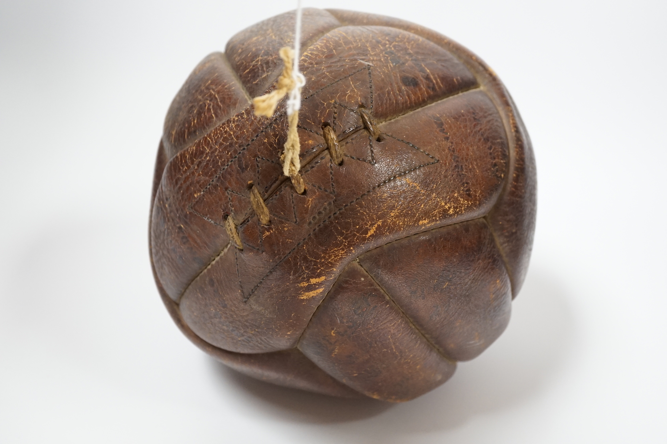 A leather football used in the Chelsea v Arsenal match, Stamford Bridge, 12 October 1935, signed by the players of both teams, football came to vendor by descent from the team ‘child mascot’ at the time